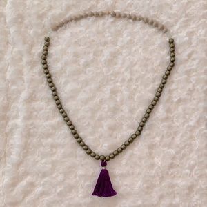 Bead and tassel long necklace